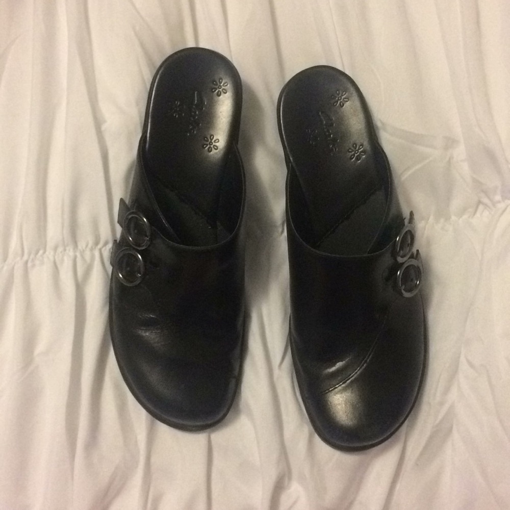 Black Clarks Clogs with buckles.